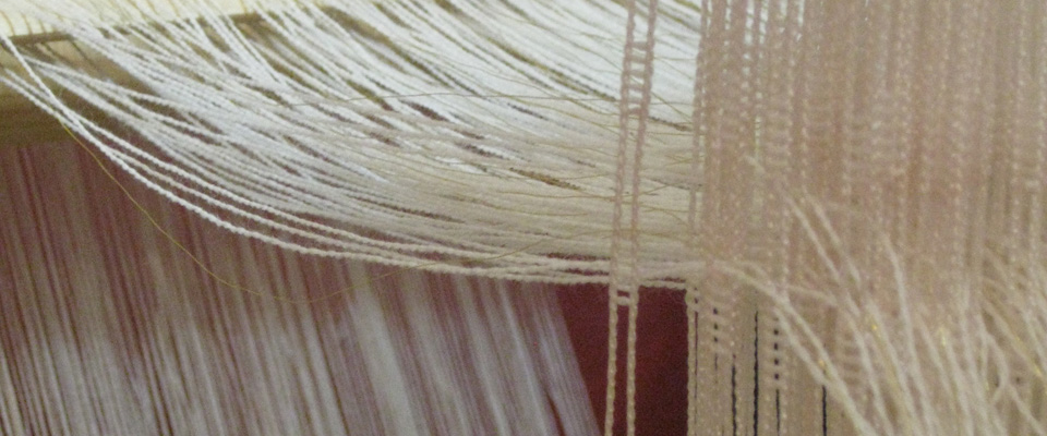 warp and heddles banner